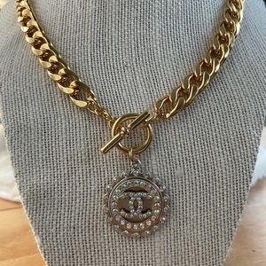 Authentic Chanel button used to create a new necklace.